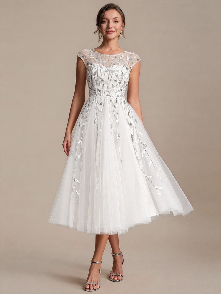 Robe midi évasée à manches courtes en patchwork transparent #Couleur_Blanc