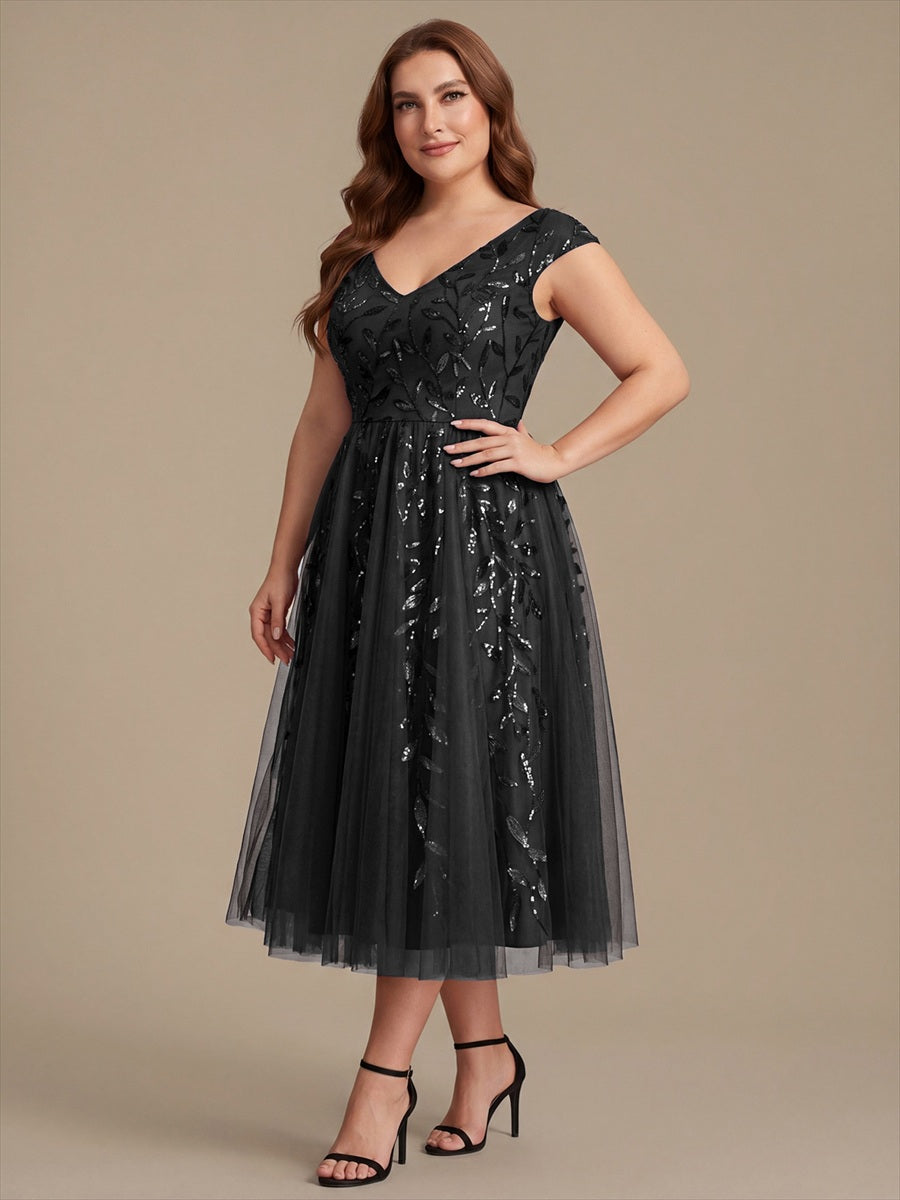 Robe midi sans manches col en V à sequins et coupe évasée #Couleur_Noir