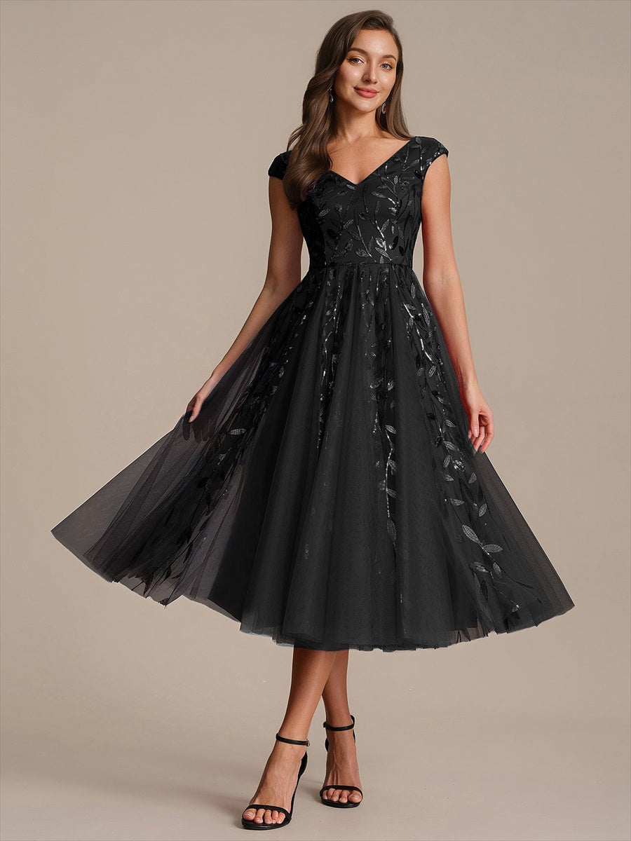 Robe midi sans manches col en V à sequins et coupe évasée #Couleur_Noir