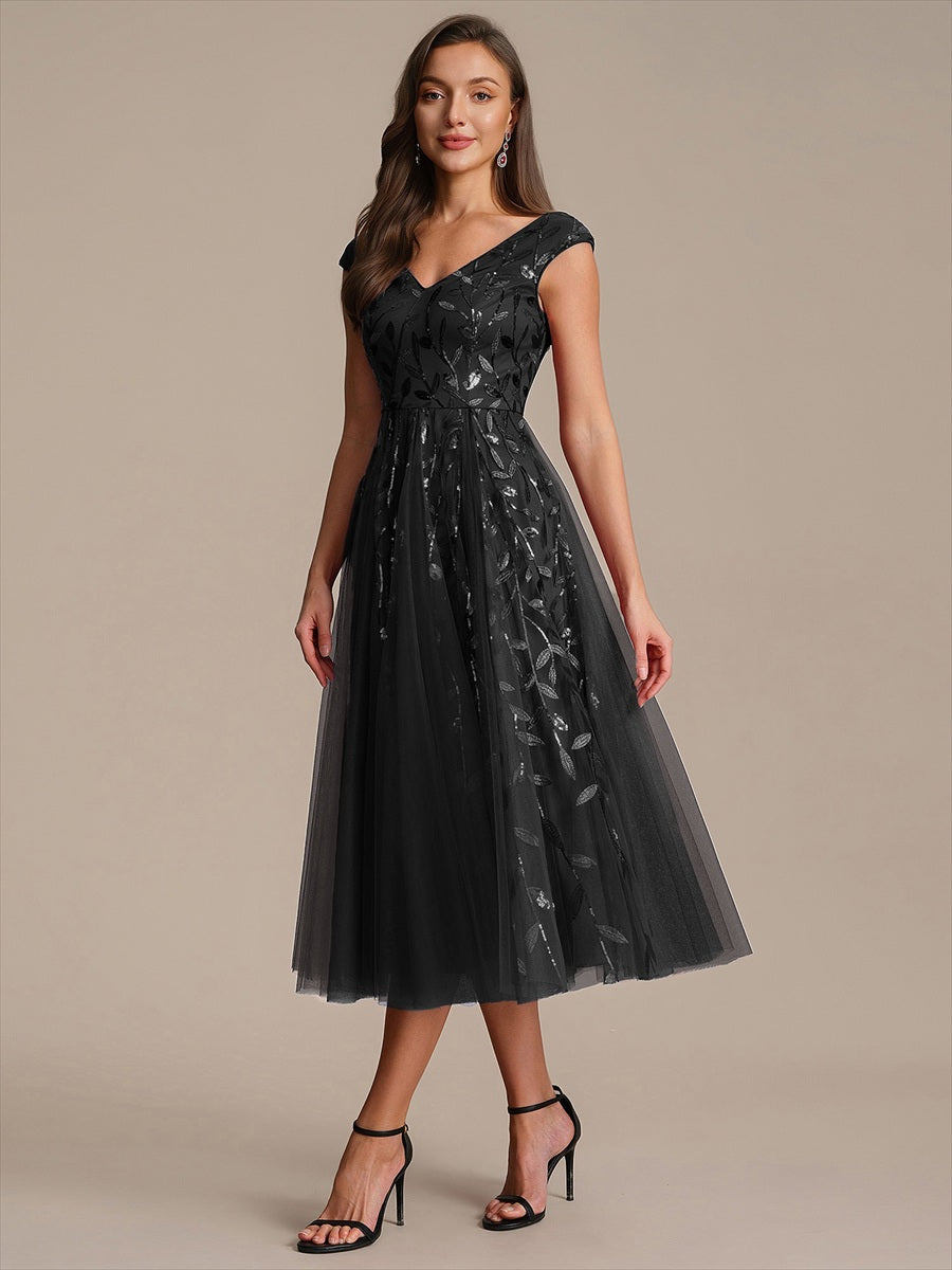 Robe midi sans manches col en V à sequins et coupe évasée #Couleur_Noir