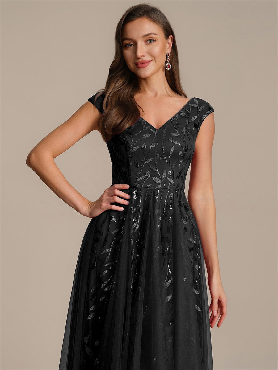 Robe midi sans manches col en V à sequins et coupe évasée #Couleur_Noir