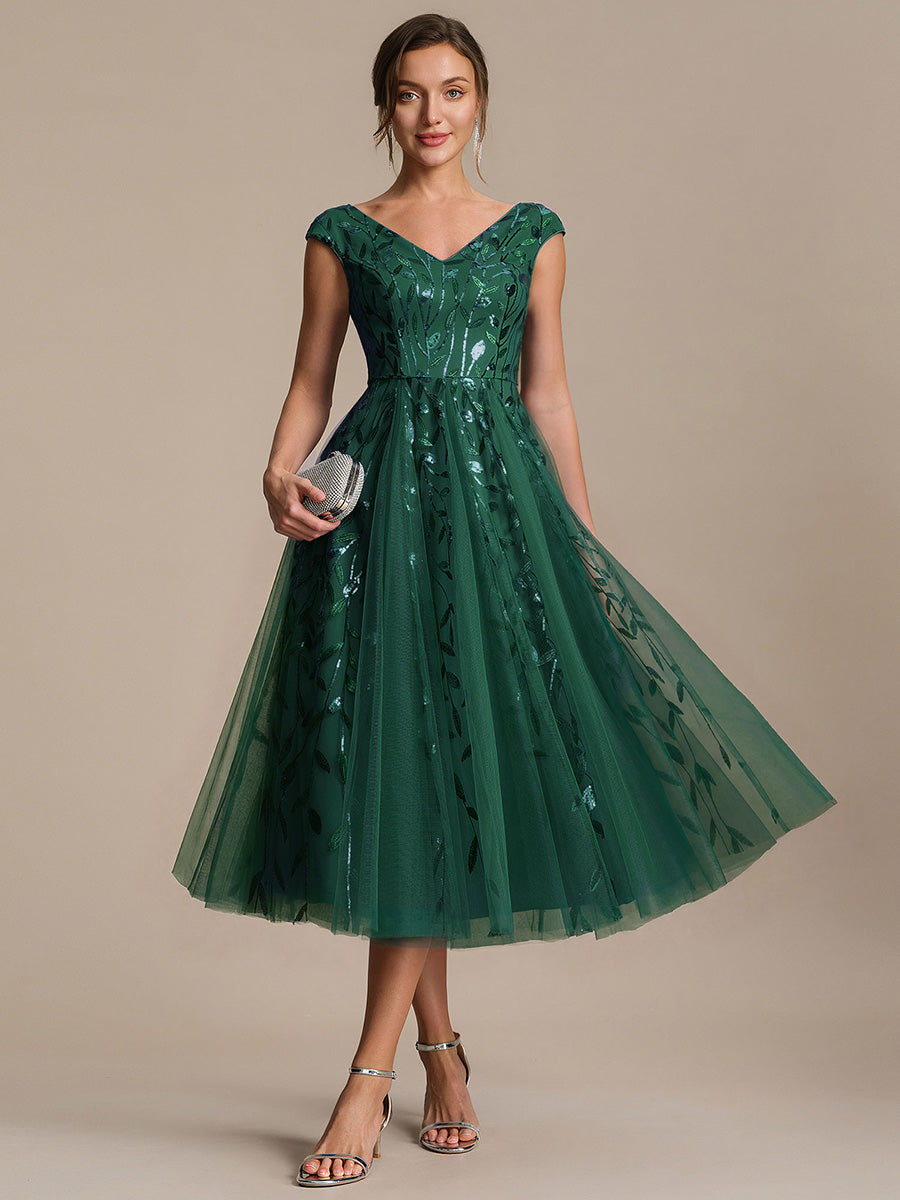 Robe midi sans manches col en V à sequins et coupe évasée #Couleur_Vert Fonce