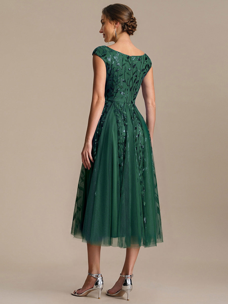 Robe midi sans manches col en V à sequins et coupe évasée #Couleur_Vert Fonce
