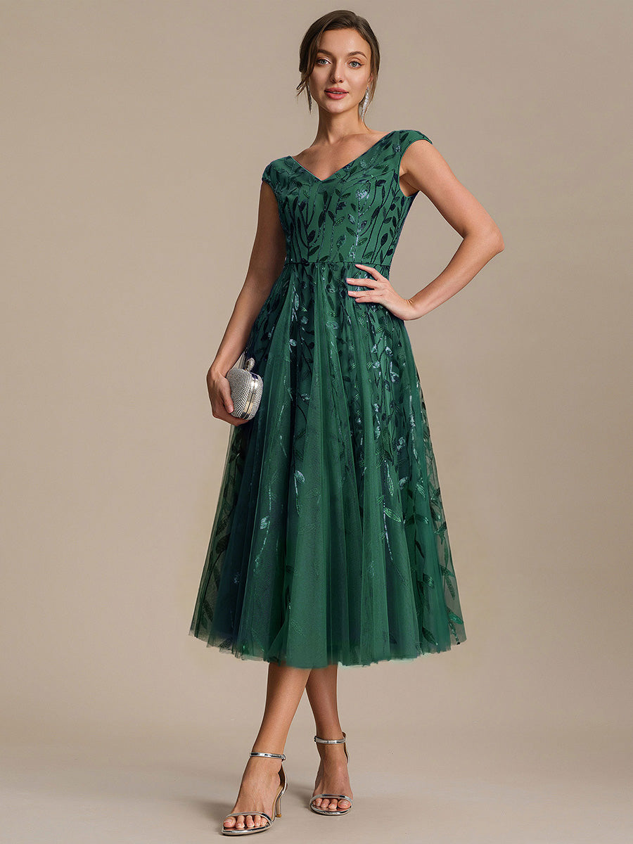 Robe midi sans manches col en V à sequins et coupe évasée #Couleur_Vert Fonce