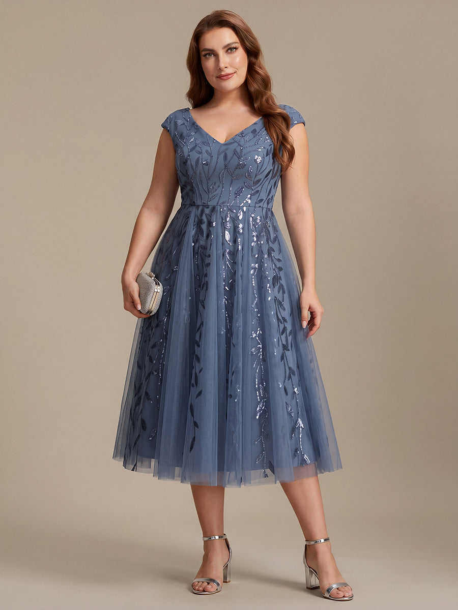 Robe midi sans manches col en V à sequins et coupe évasée #Couleur_Marine Fume