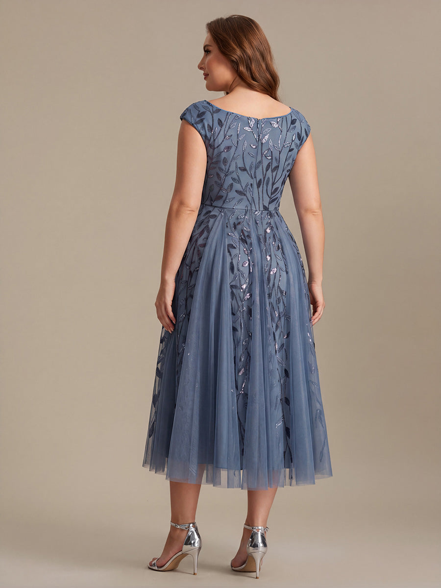 Robe midi sans manches col en V à sequins et coupe évasée #Couleur_Marine Fume