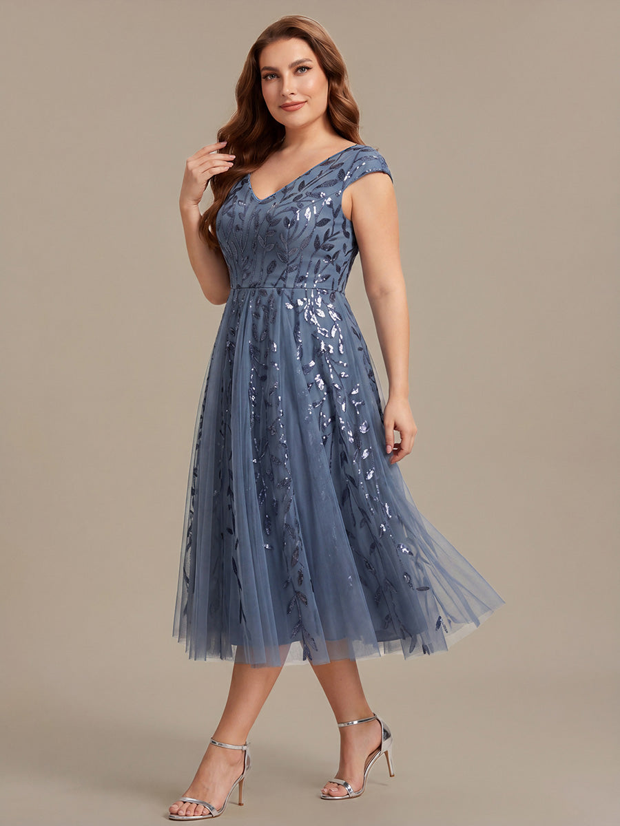 Robe midi sans manches col en V à sequins et coupe évasée #Couleur_Marine Fume