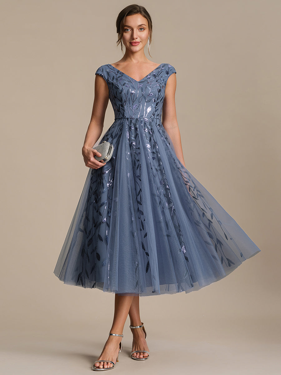 Robe midi sans manches col en V à sequins et coupe évasée #Couleur_Marine Fume