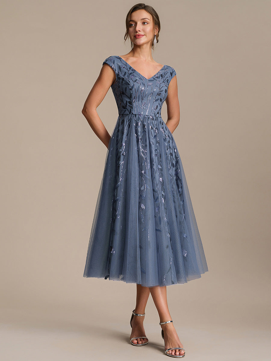 Robe midi sans manches col en V à sequins et coupe évasée #Couleur_Marine Fume