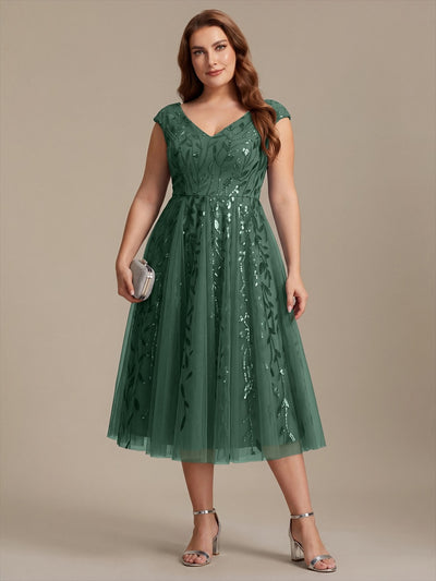 Robe invitée mariage grande taille à paillettes coupe trapèze