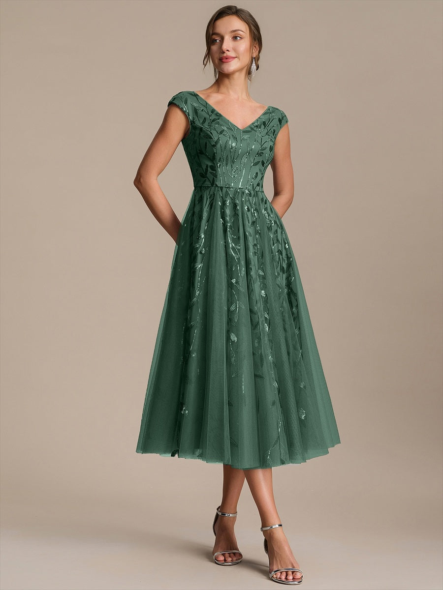 Robe midi sans manches col en V à sequins et coupe évasée #Couleur_Eucalyptus