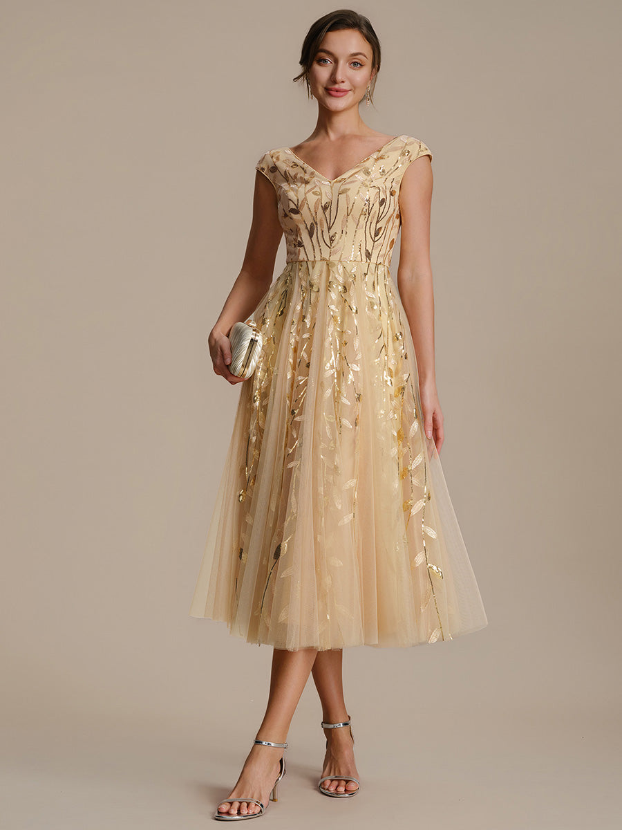 Robe midi sans manches col en V à sequins et coupe évasée #Couleur_Dorée