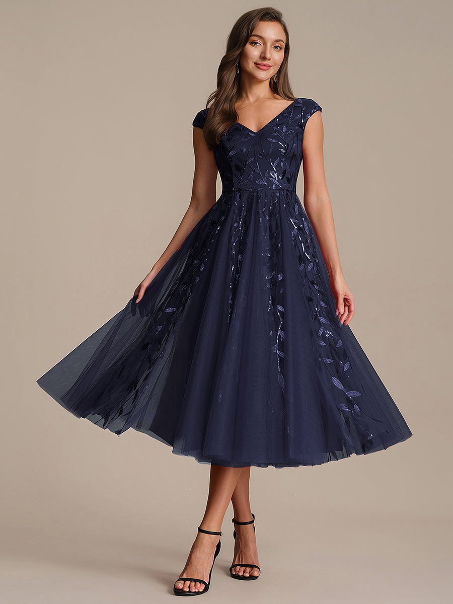 Robe midi sans manches col en V à sequins et coupe évasée #Couleur_Bleu Marine