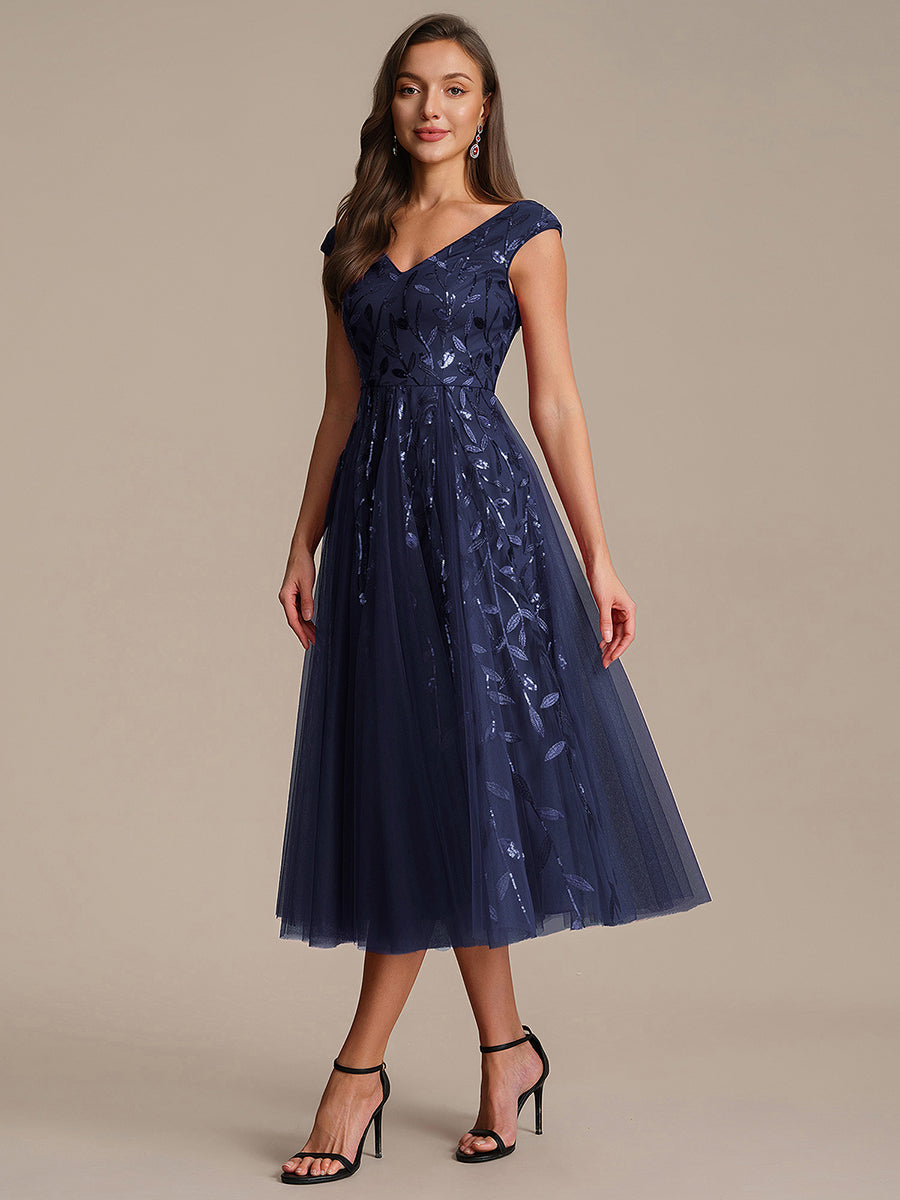 Robe midi sans manches col en V à sequins et coupe évasée #Couleur_Bleu Marine