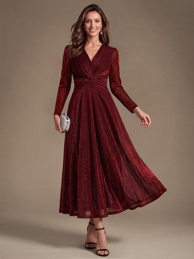 Robe midi trapèze scintillante en maille Lurex col croisé manches longues