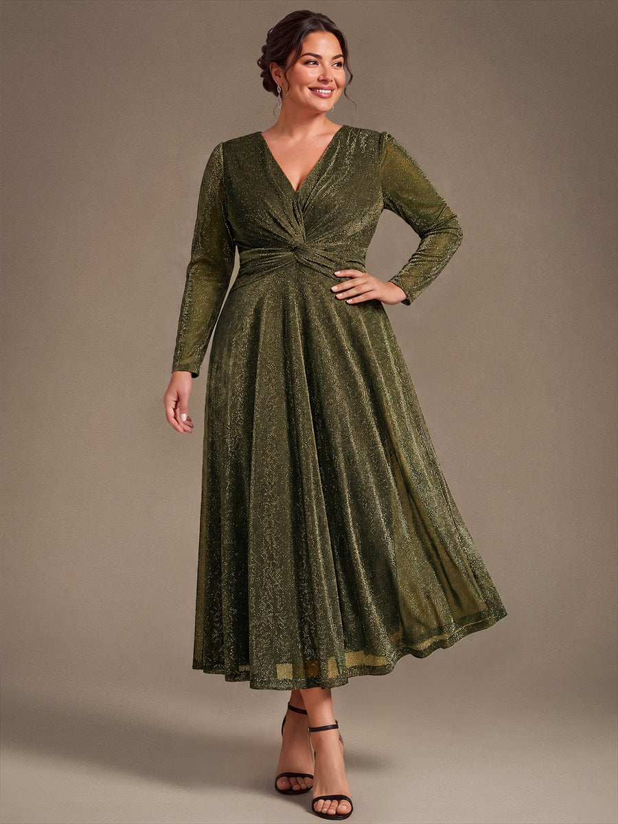 Robe longueur th¨¦ ¨¤ manches longues col crois¨¦ tr¨¨s extensible avec fermeture ¨¦clair au dos et d¨¦tail de n?ud #Couleur_Or métallique