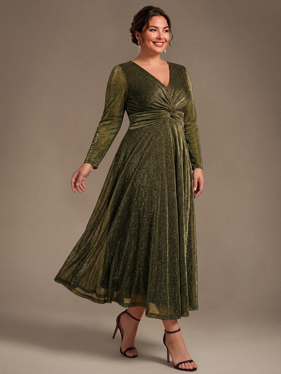 Robe longueur th¨¦ ¨¤ manches longues col crois¨¦ tr¨¨s extensible avec fermeture ¨¦clair au dos et d¨¦tail de n?ud #Couleur_Or métallique