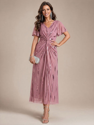 Robe en tulle à sequins longueur thé, col V et manches volantées