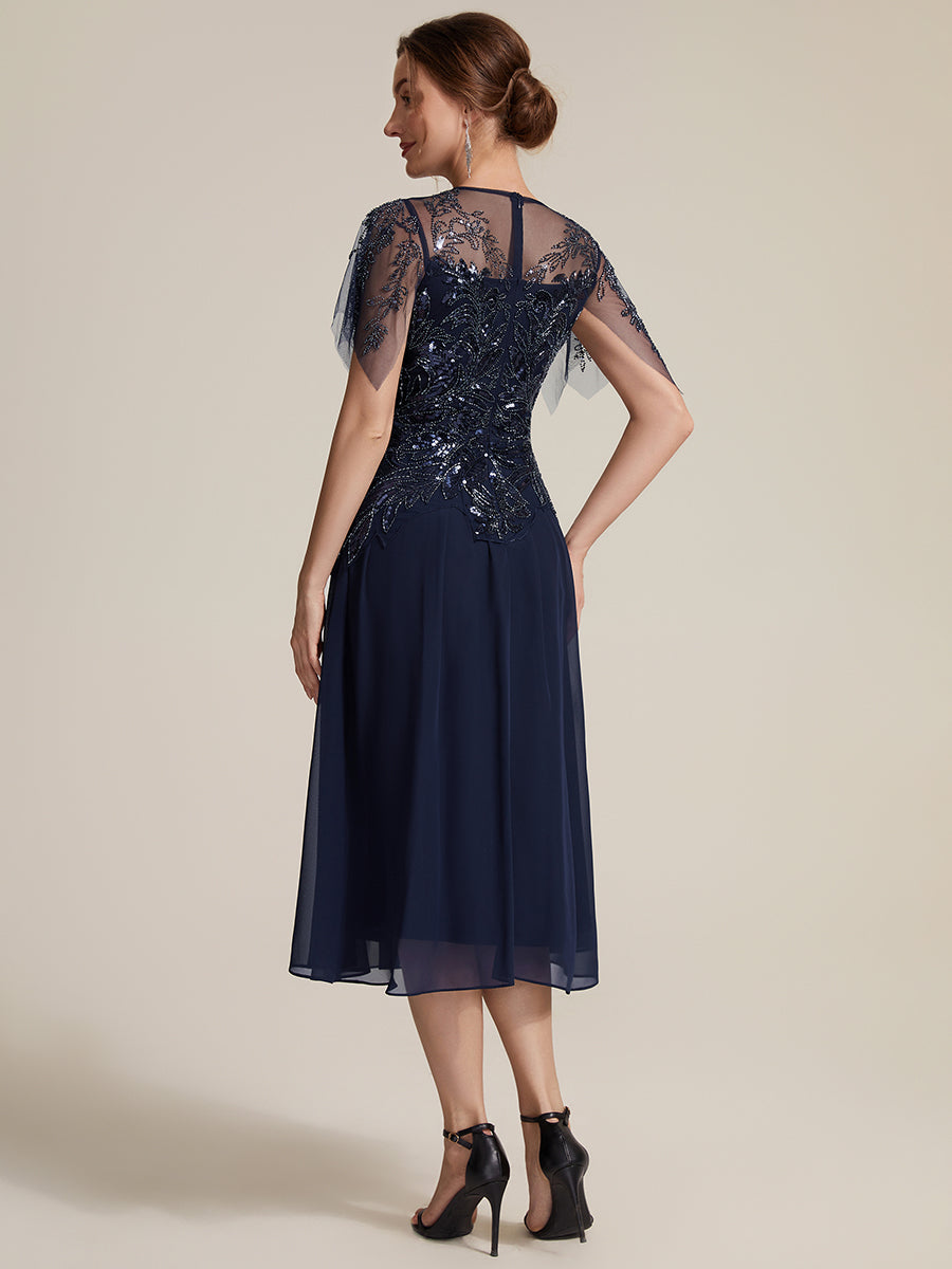 Robe midi A ligne à manches courtes en sequins avec col rond et volants #Couleur_Bleu Marine
