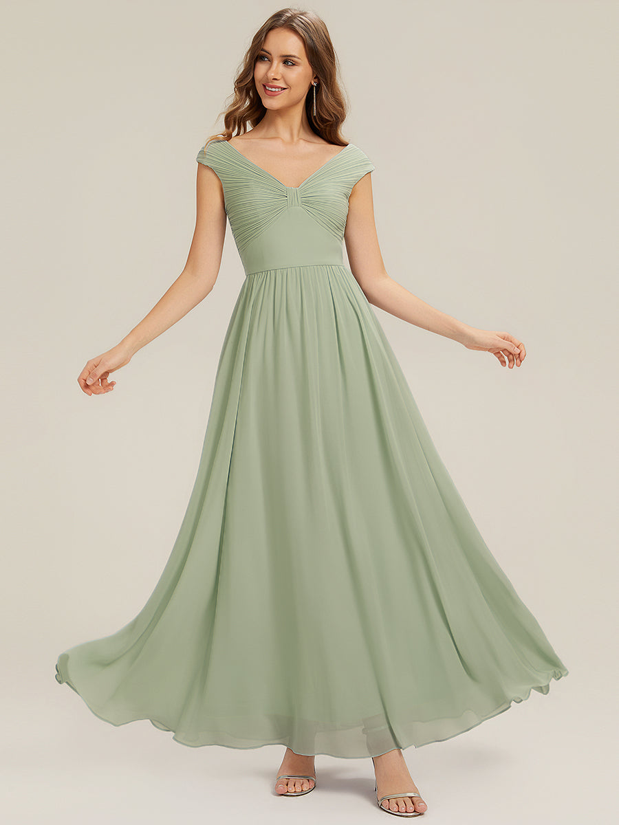 Robe longue sans manches décolletée en V avec une taille haute et des détails plissés #Couleur_Menthe Verte