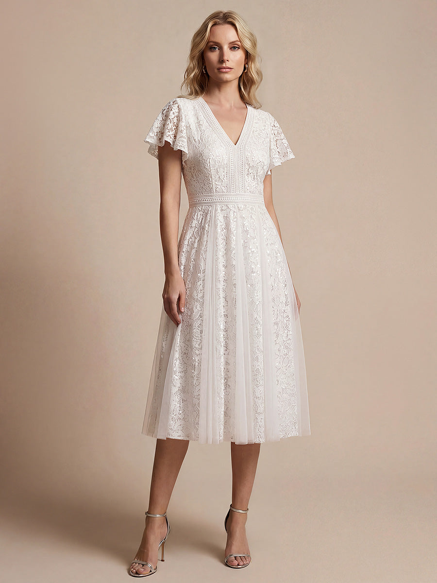 robe midi évasée en tulle avec manches courtes décolleté en V et volants #Couleur_Blanc