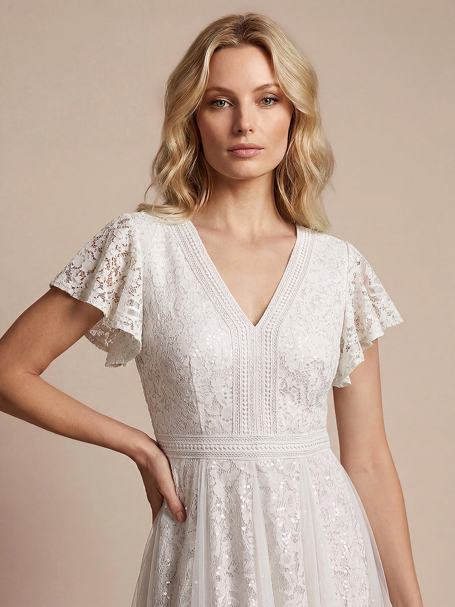 robe midi évasée en tulle avec manches courtes décolleté en V et volants #Couleur_Blanc