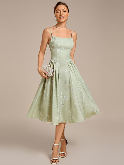 Robe de mariée à fleurs et bretelles spaghetti