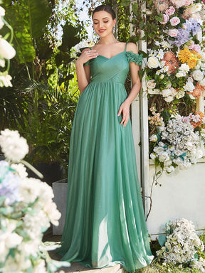 Robe de soirée brillante à col en V et à épaules dénudées