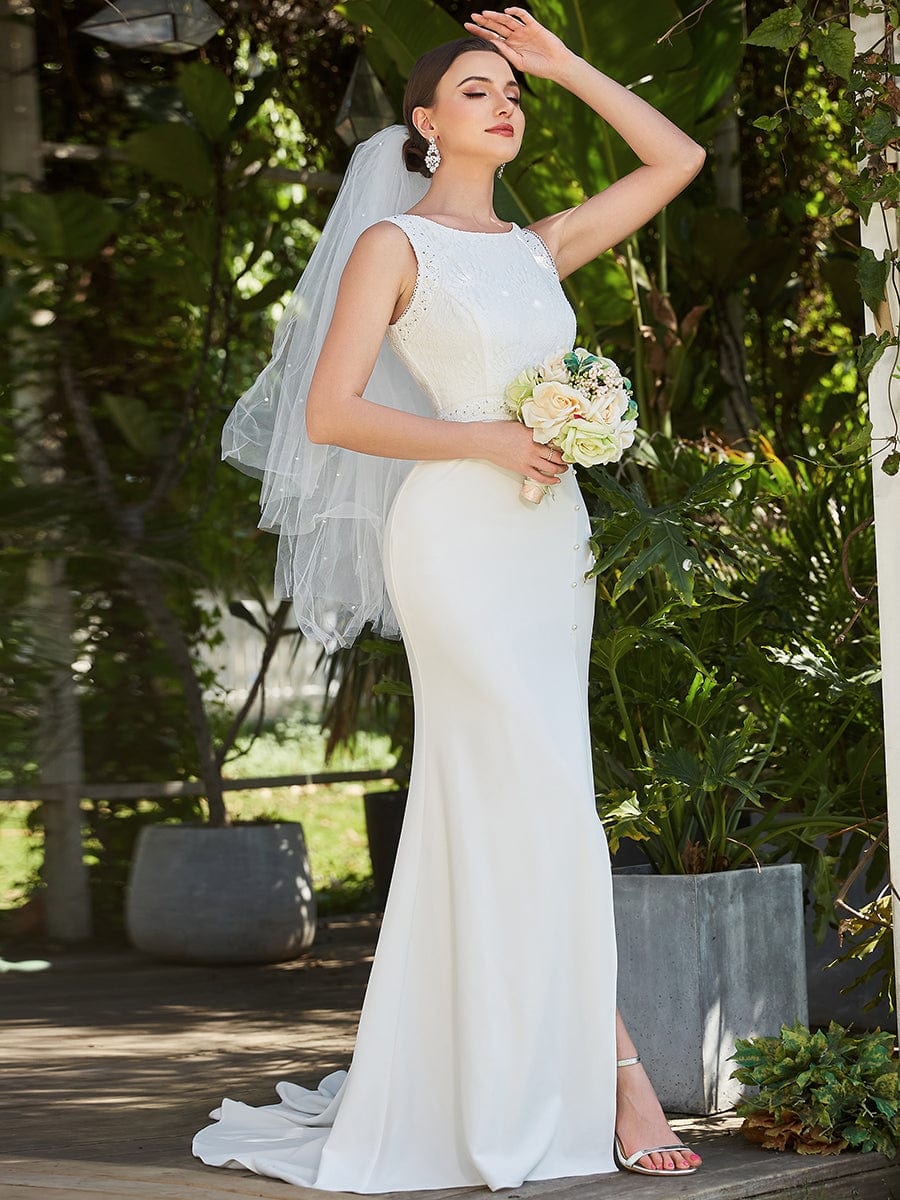 Robe de mariée en queue de poisson fendue sur le côté en dentelle florale sans manches