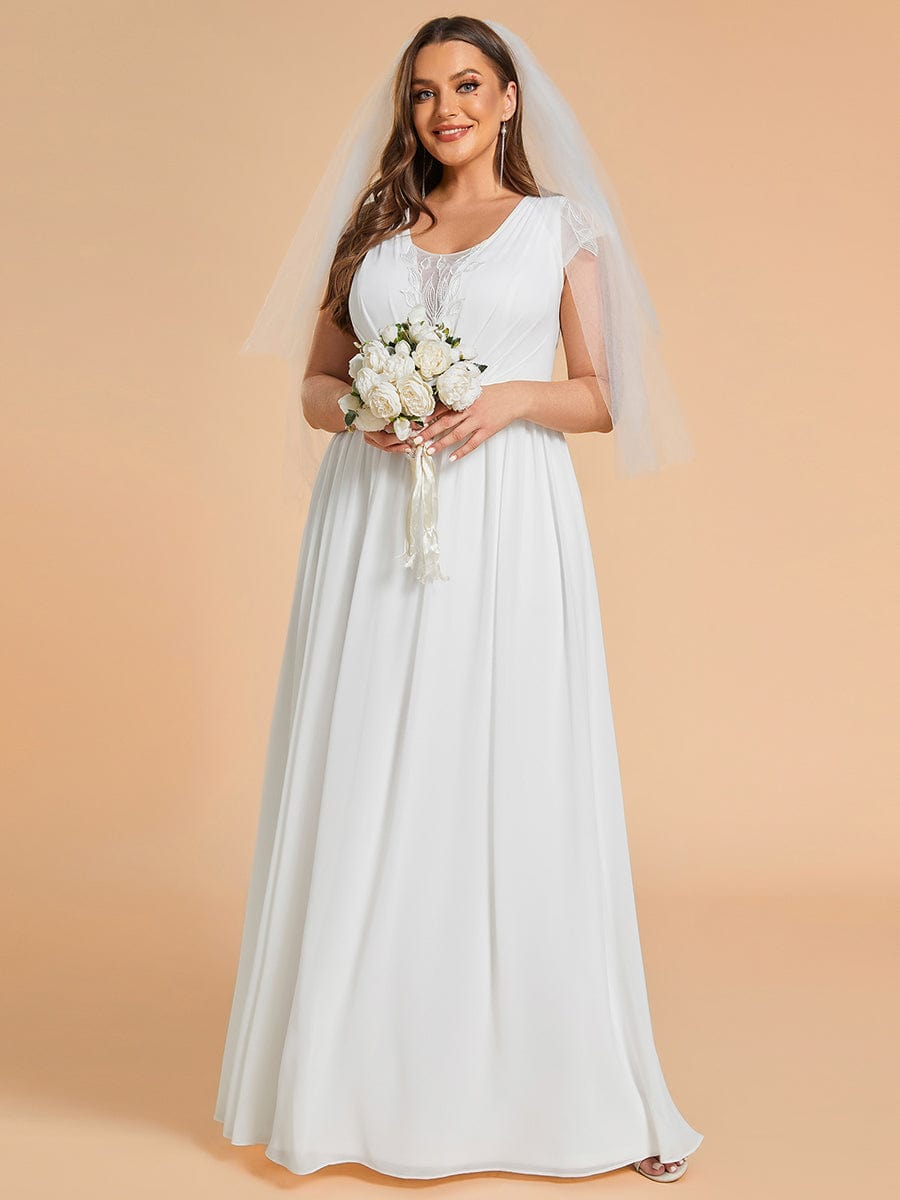Robes de mariée grande taille à col en V et en mousseline plissée à manches courtes