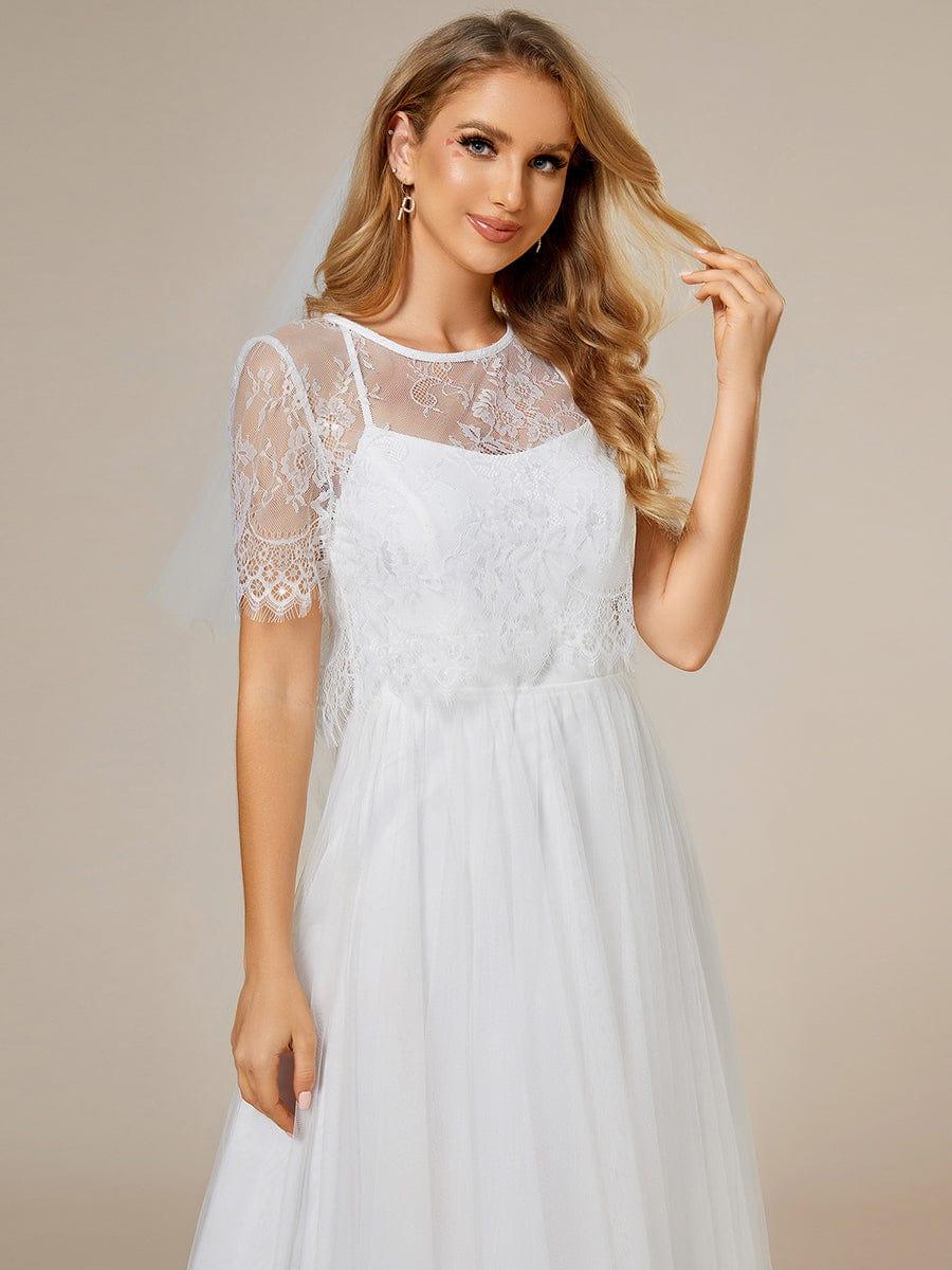 Robe de mariée trapèze avec veste en dentelle et bretelles spaghetti #Couleur_Blanc
