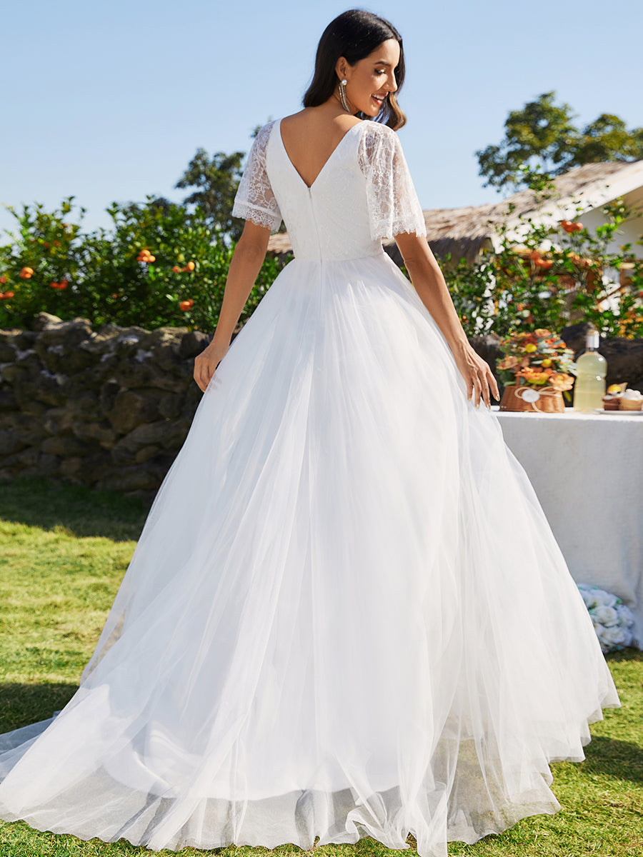 Robe de mariée en tulle avec col en V et manches plissées #color_Blanc