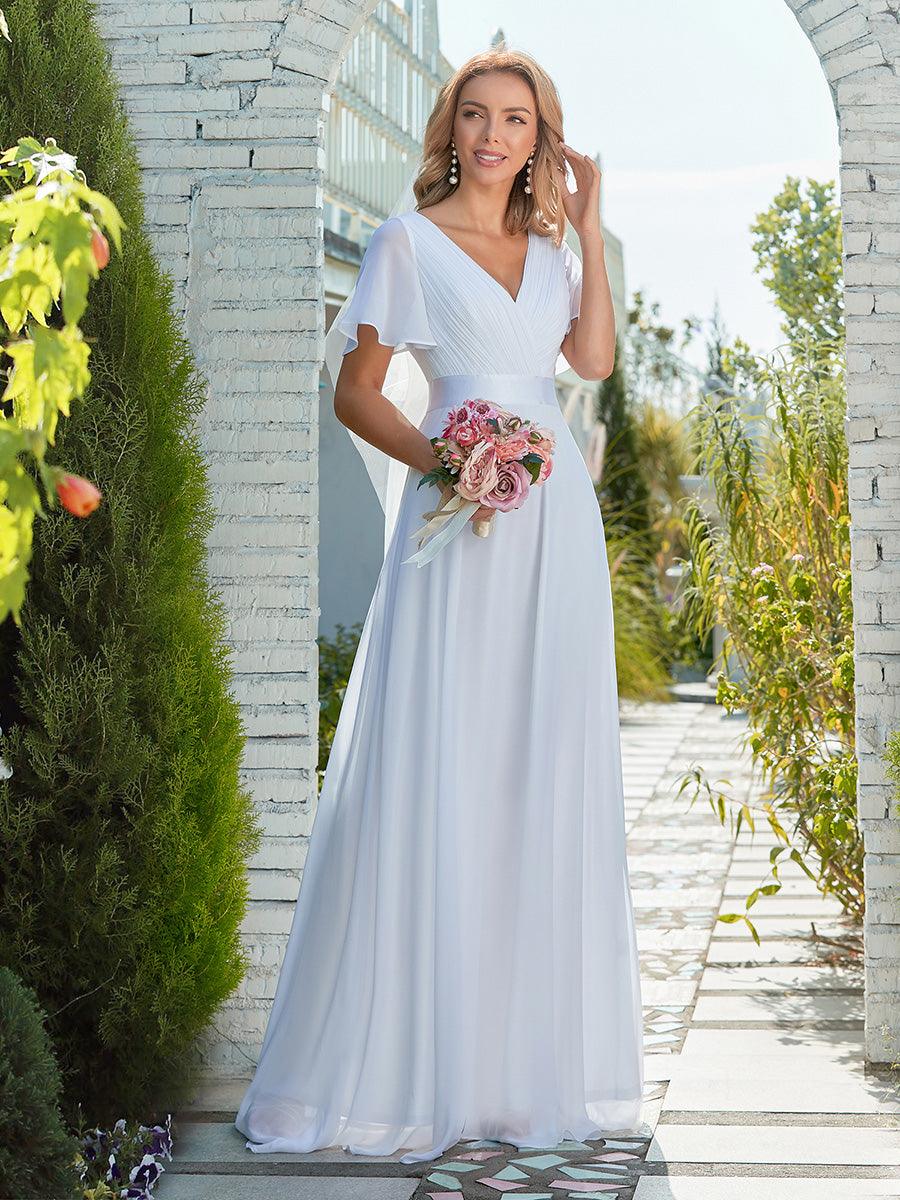 Maxi robe de mariée minimaliste en mousseline de soie avec ceinture en satin