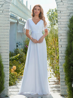 Maxi robe de mariée minimaliste en mousseline de soie avec ceinture en satin