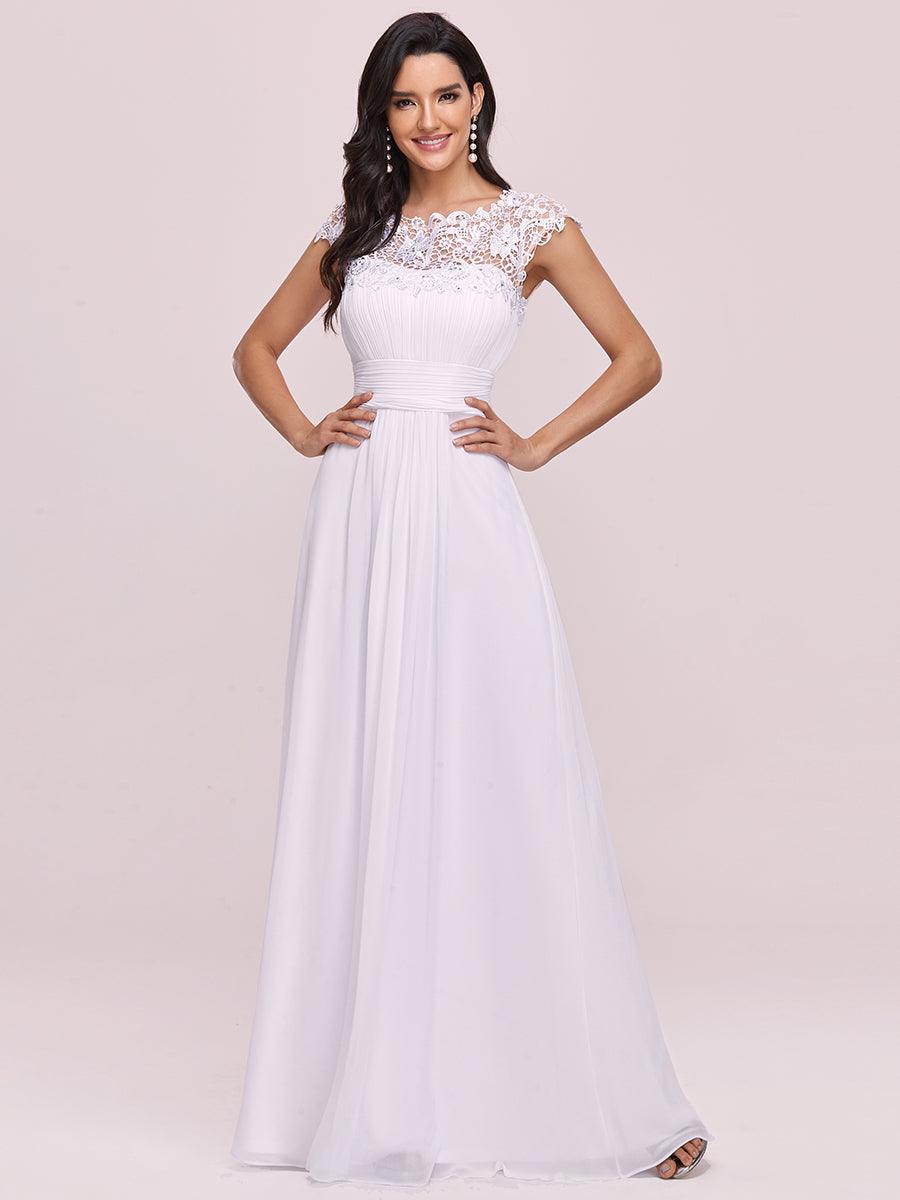 Robe de mariée en mousseline plissée unie avec décorations en dentelle #Couleur_Blanc